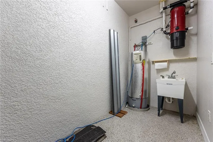 Air Conditioned Space for a Workshop, Hobby Room or Storage includes a Laundry Tub & Central Vacuum Equipment