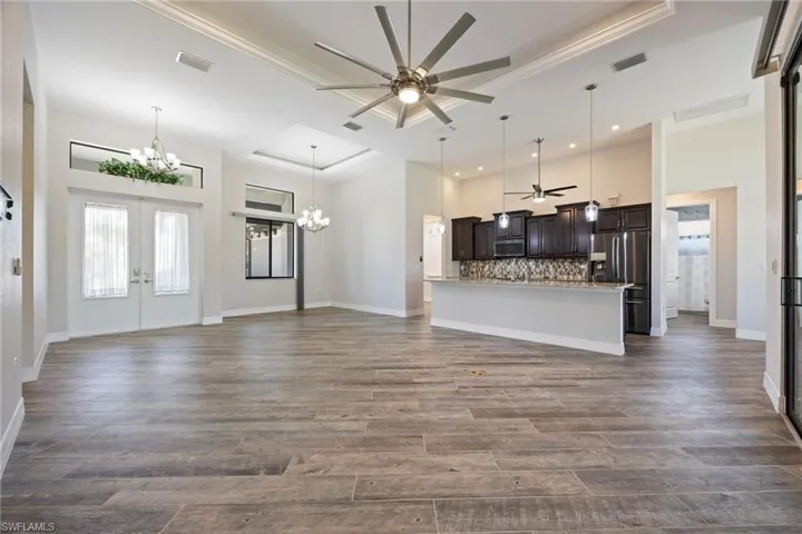 View of Foyer, Formal Dining Area, Open Kitchen & Living Area