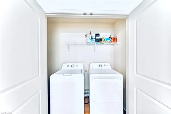 Washroom with independent washer and dryer and laundry area