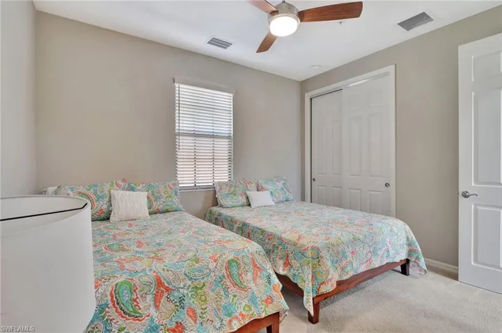 2nd Bedroom with fan and spacious closet