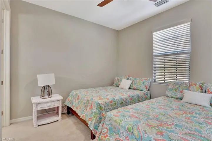 Large 2nd bedroom featuring ceiling fan