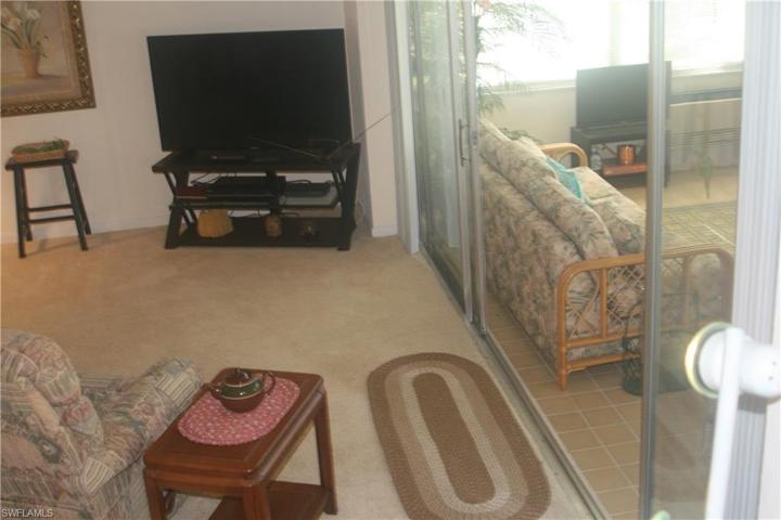 Step down into enclosed lanai