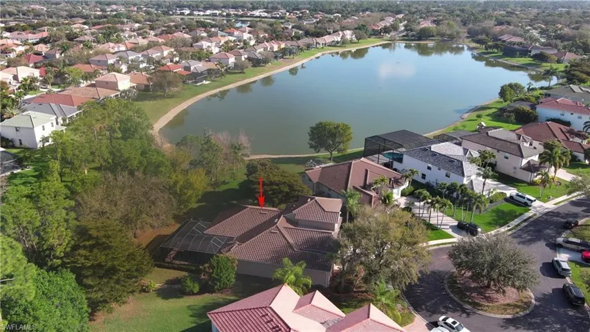 Aerial view of residential area with a nearby body of water