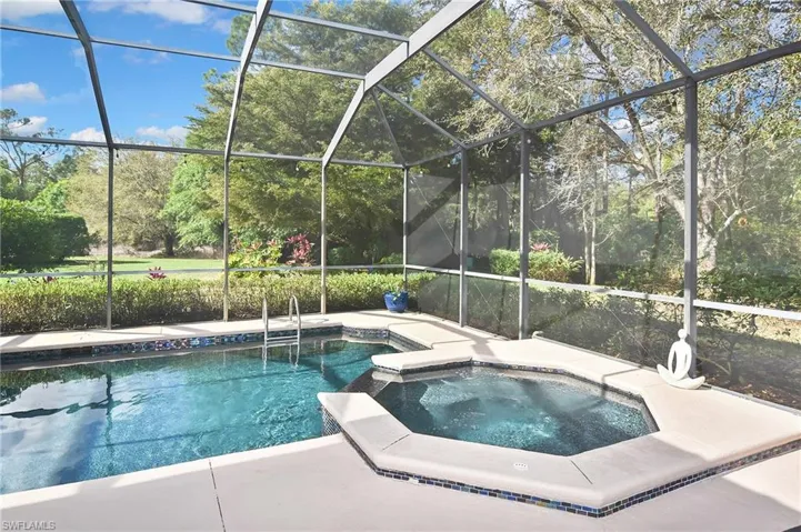 Integrated pool / hot tub with a lanai and a sunroom