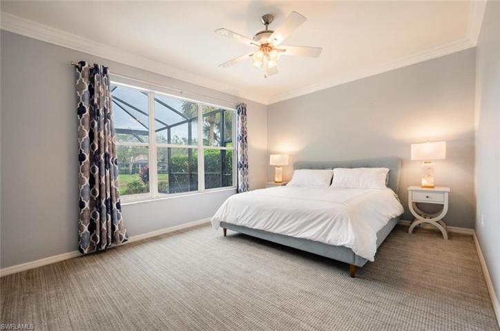 Master Bedroom with Lake and Pool Views