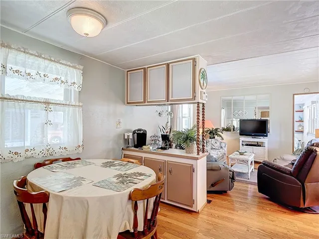 Kitchen featuring light wood-type flooring