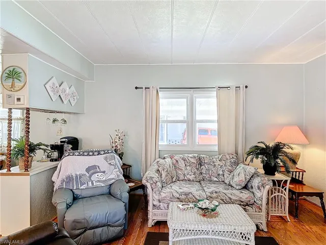 Living room featuring hardwood / wood-style flooring