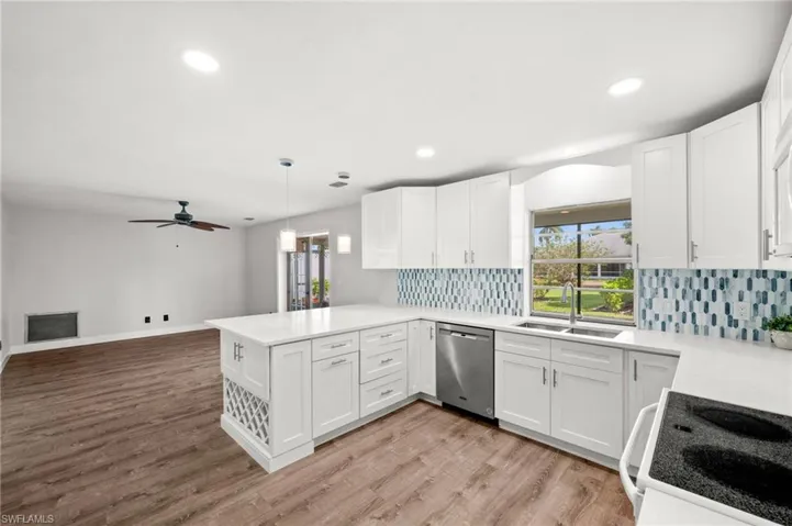 Kitchen Overlooks the family room and Lanai / backyard