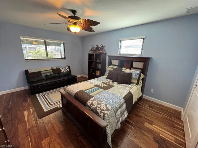 2ND UPSTAIRS Bedroom featuring ceiling fan and dark hardwood / wood-style floors