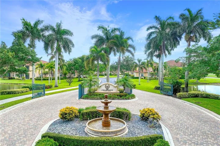 View of property's community with a water view and a lawn