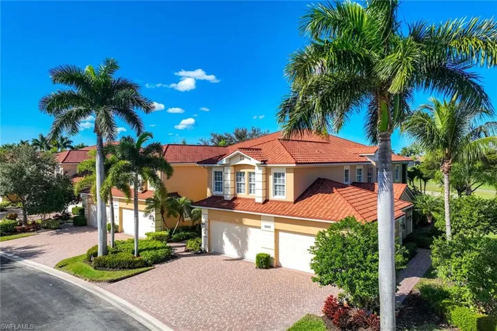 Mediterranean / spanish-style house featuring stucco siding, decorative driveway, a tile roof, and a garage