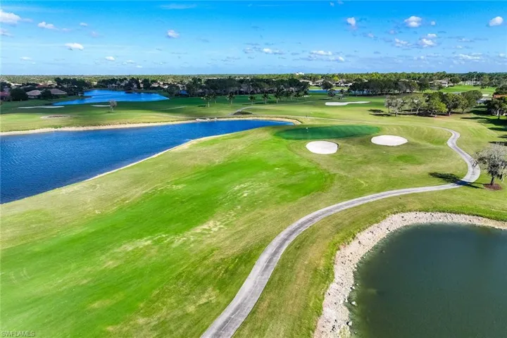 Bird's eye view of a large body of water and a golf club