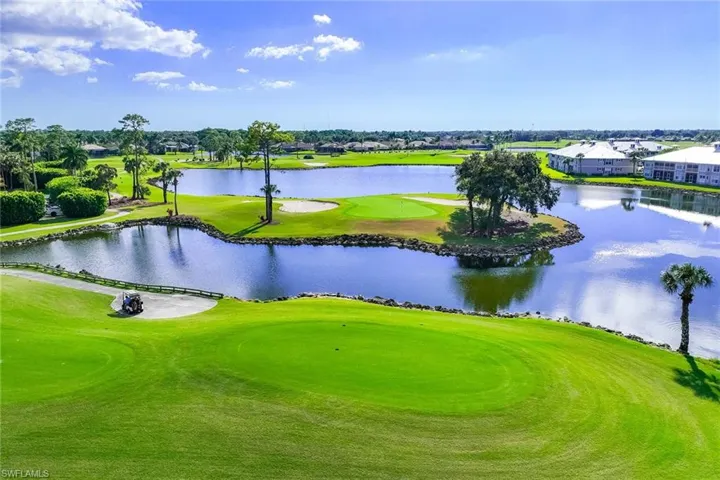View of community with a water view and view of golf course