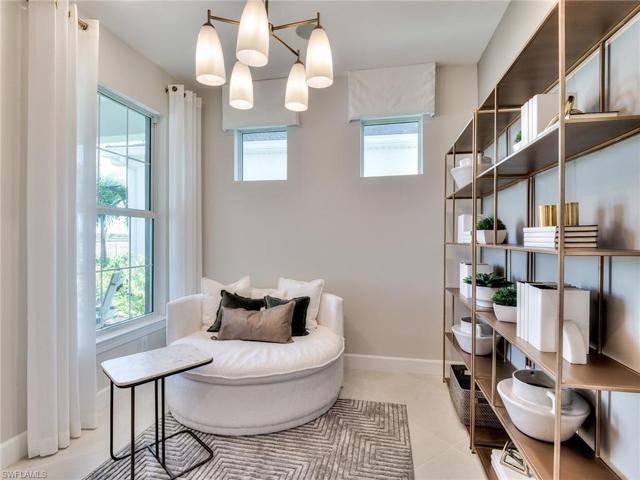 Den - Photos are from the furnished model. Options for this home may vary