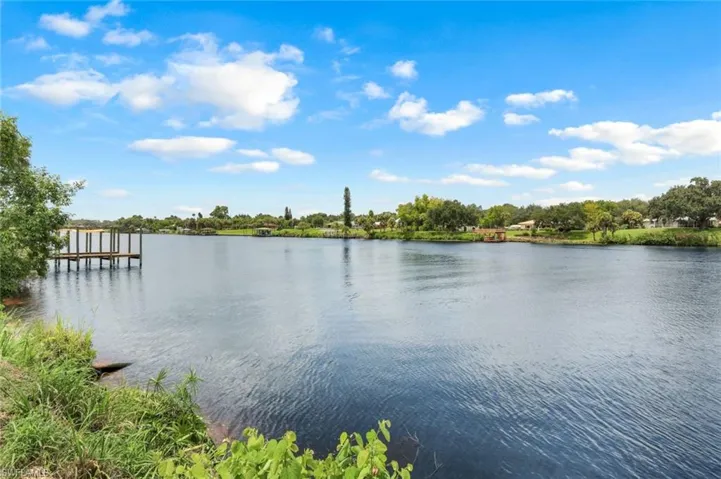 View of water feature featuring a dock