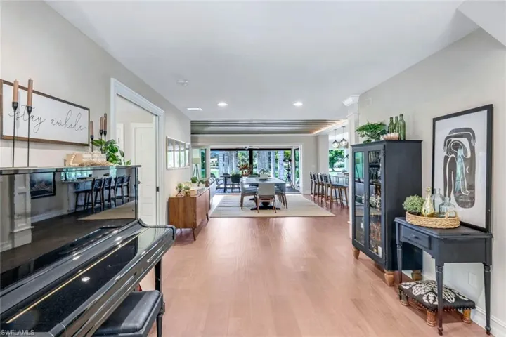 Living room with light wood-type flooring