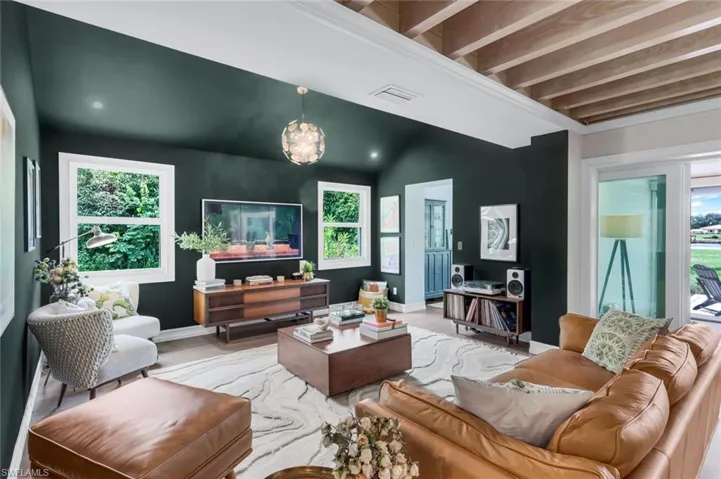 Living room with beamed ceiling