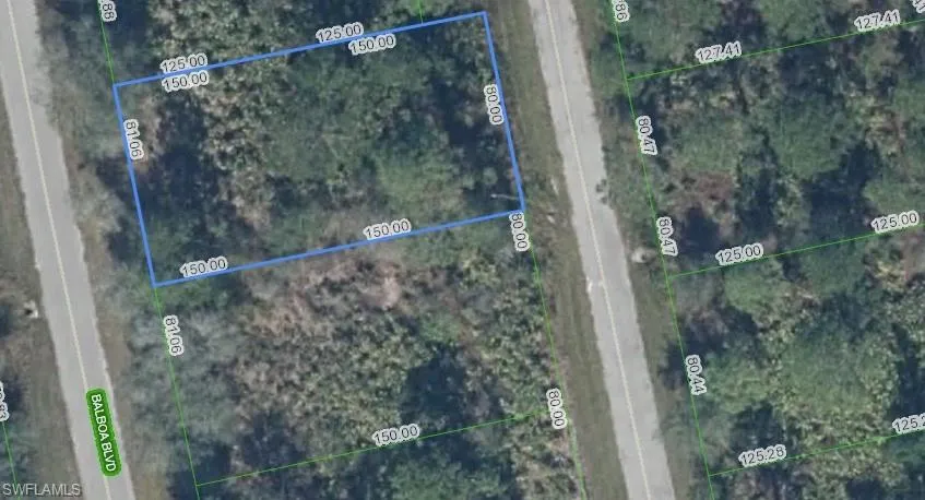 Aerial view of property's location with property parcel outlined