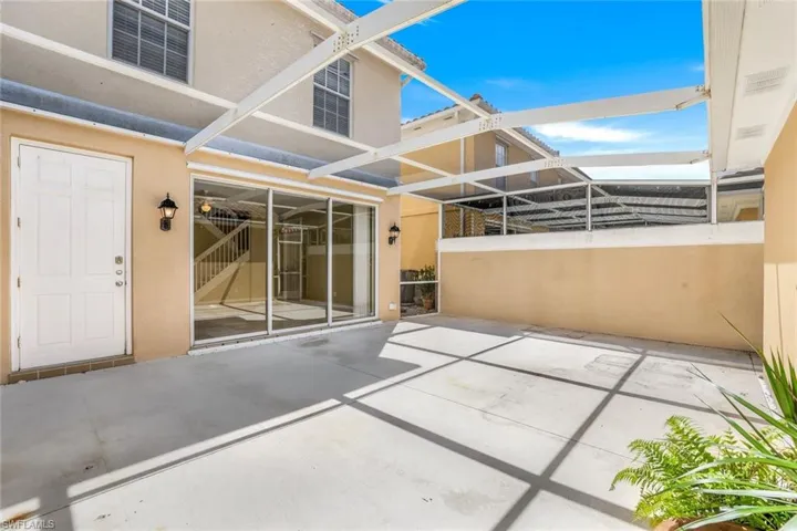 View of patio / terrace featuring glass enclosure