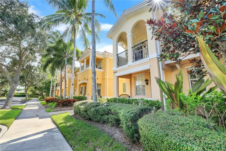 View of front of house featuring a balcony