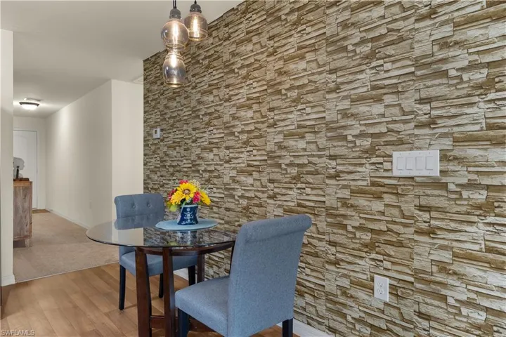 Dining room with light hardwood / wood-style floors