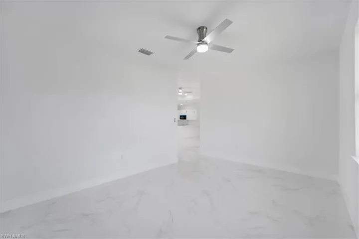 Unfurnished room with ceiling fan