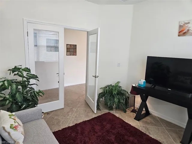 Tiled office with french doors