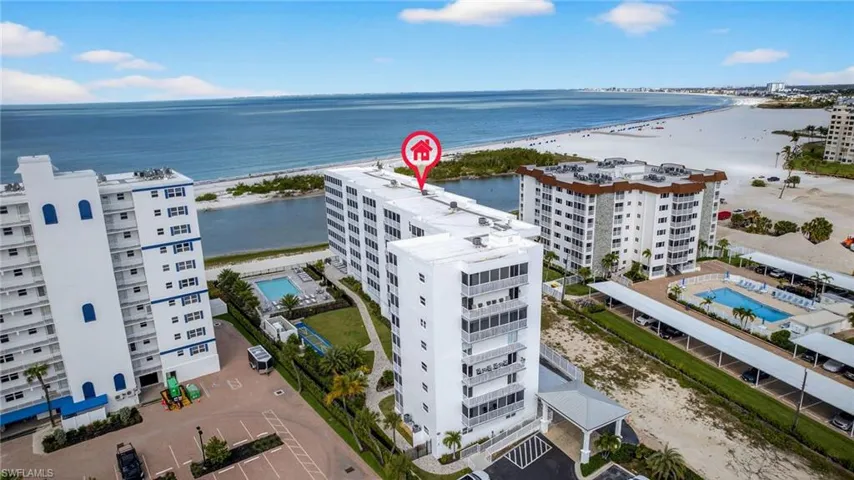 Drone / aerial view of the building and Gulf of Mexico. - Virtually Edited Image