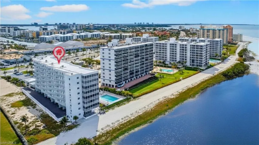 City view with Gulf of Mexico and pool. - Virtually Edited Image