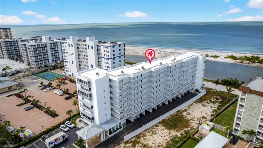 Aerial view of building and Gulf of Mexico. - Virtually Edited Image