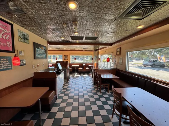 Dining room with wooden walls