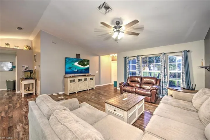 Family room view from the master bedroom door area. Luxury vinyl wood plank flooring with the looks awesome!