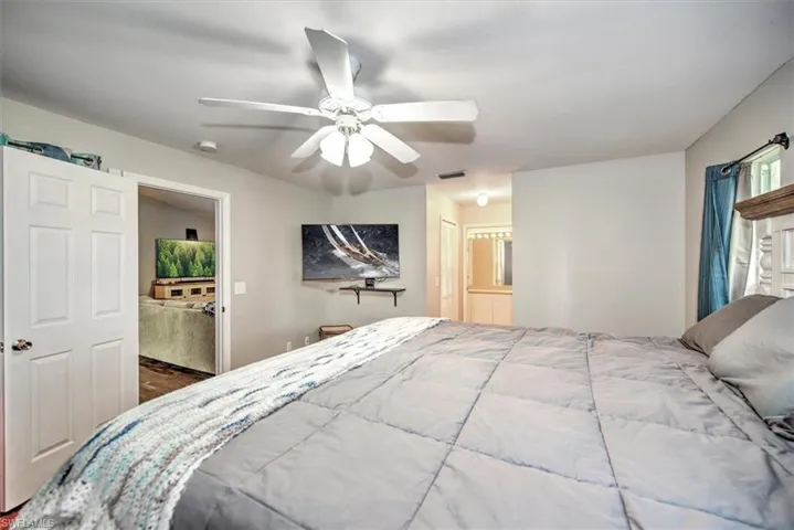 Master bedroom view toward the bathroom. 2 walk in closets as you pass through to the bathroom