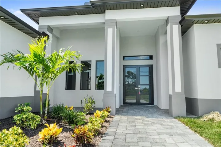 Entrance to property featuring french doors