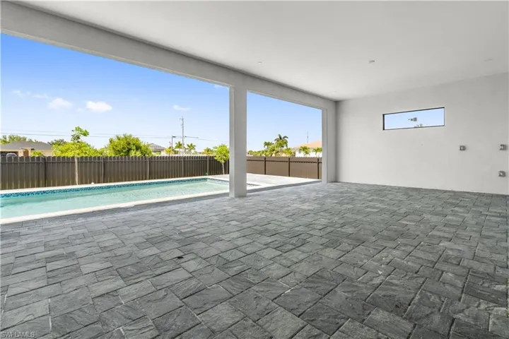 View of patio featuring a fenced in pool