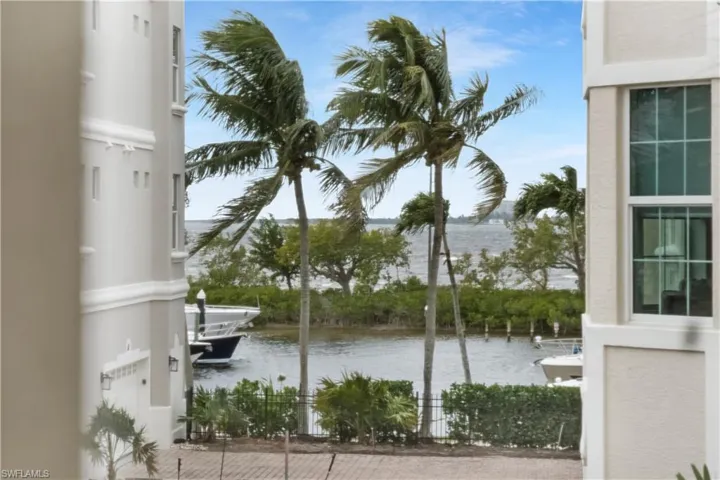 Step onto the back lanai and take in serene views of the marina and river.
