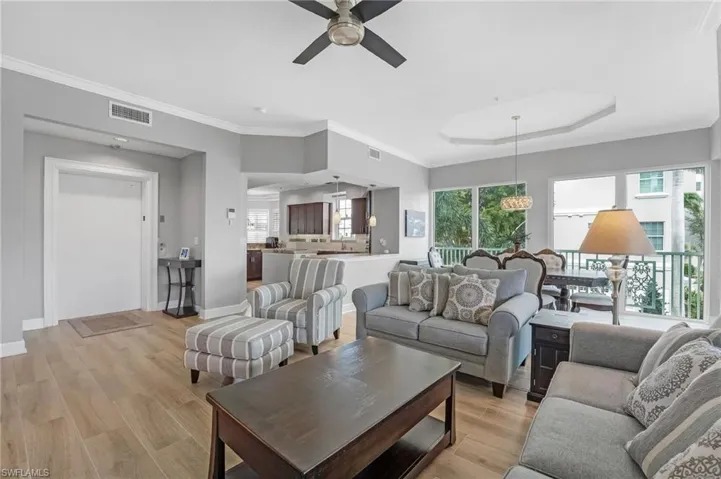 The remodel opened the kitchen to the main living area, seamlessly capturing breathtaking views of the golf course and tranquil lakes.