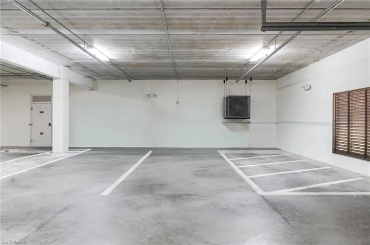 Garage featuring a parking deck