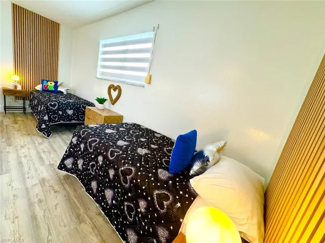 Bedroom featuring light wood-style floors