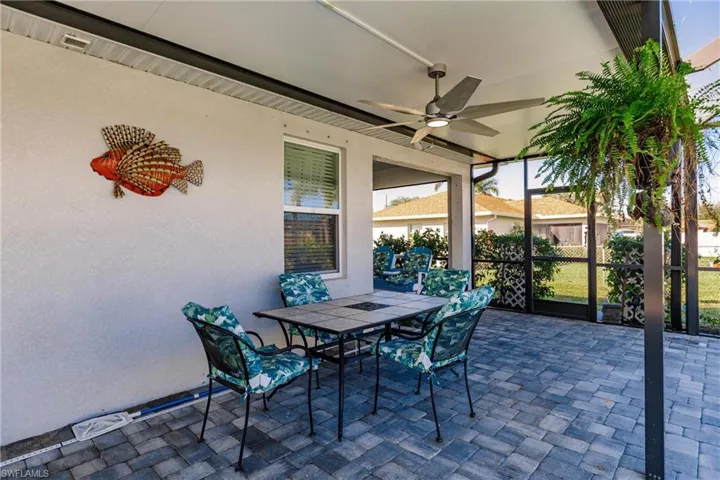 View of patio with ceiling fan