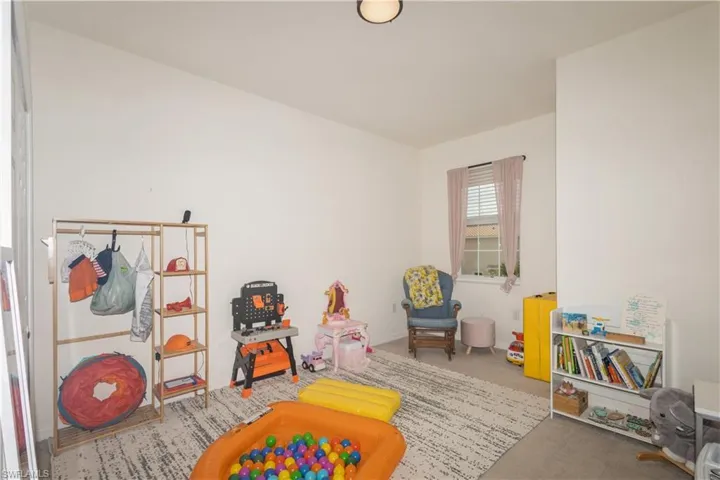 Game room featuring carpet