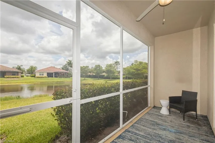 Sunroom with a water view