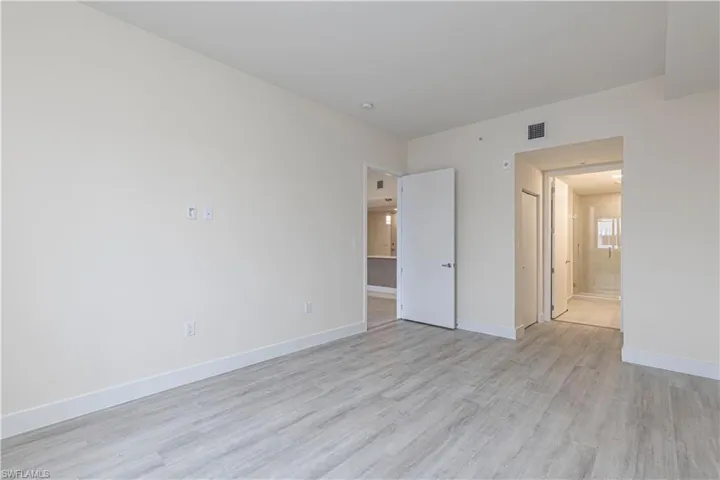 Spare room featuring light hardwood / wood-style floors