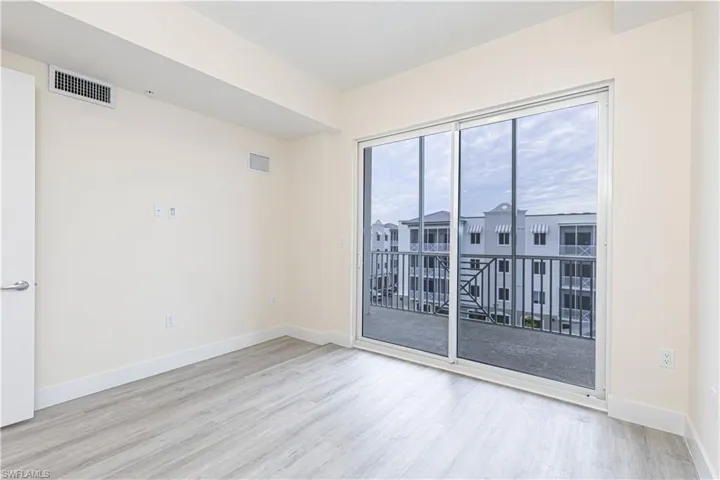 Spare room featuring light hardwood / wood-style flooring