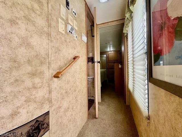 Hall with carpet flooring