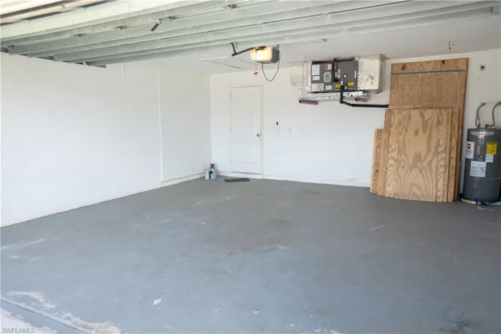 #2 Walk in closet with light tile patterned flooring