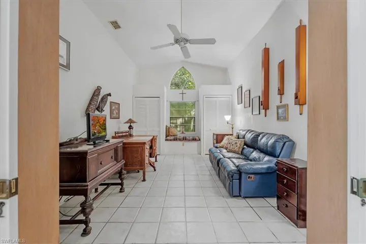 Bedroom 3 offers bench seating, custom window, dual closets and built in shelving