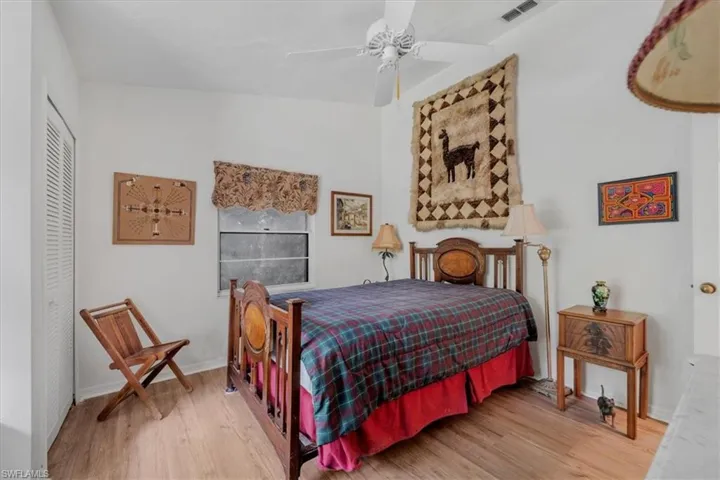 Bedroom 2 offers bench seating and dual closets