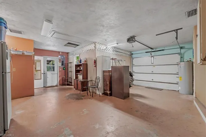 Garage with bonus space and half bath