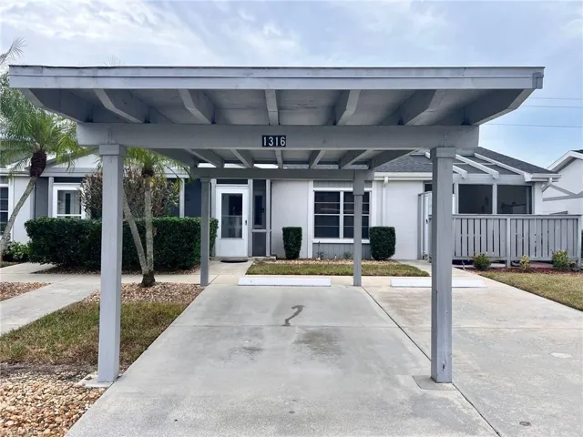 View of front of property featuring stucco siding